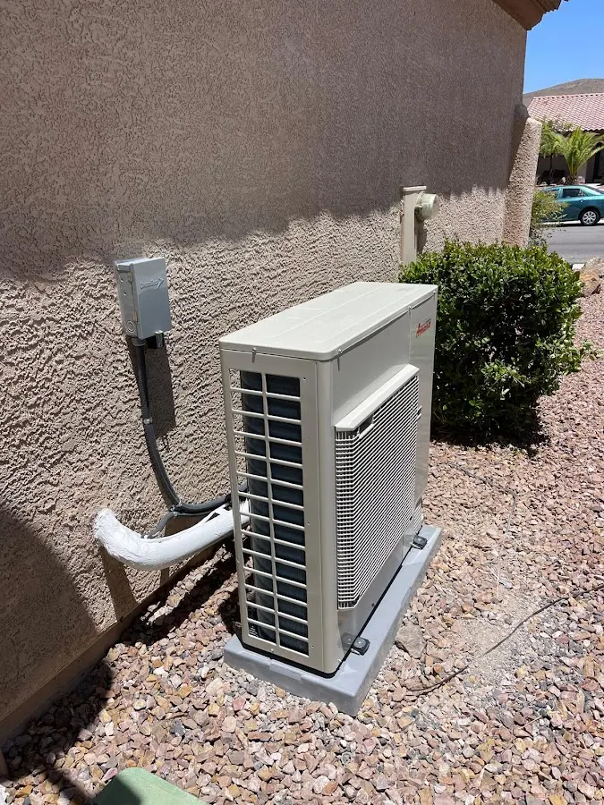 Residential air conditioning condenser unit in Fruitport